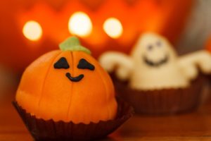 A Halloween pumpkin cupcake.